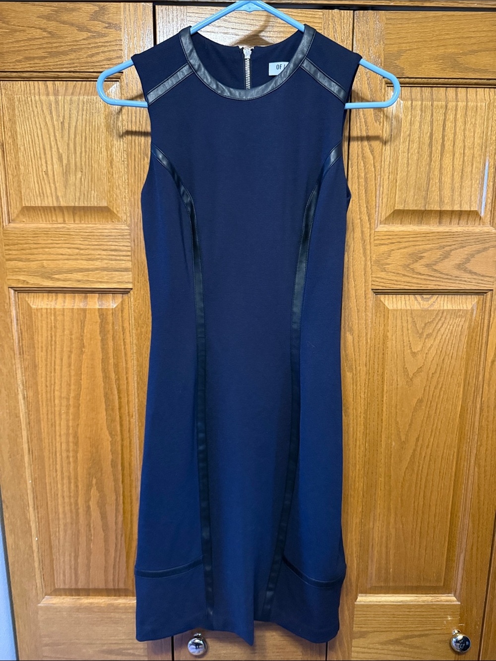 Sleeveless Navy Sheath Dress with Faux Leather Trim